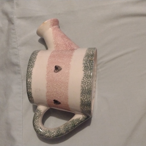 A clay watering can - Picture 1 of 6